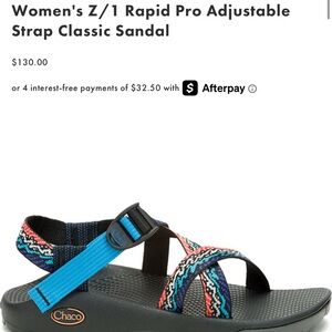 Chacos! Worn once! Blue, orange, and white wave straps